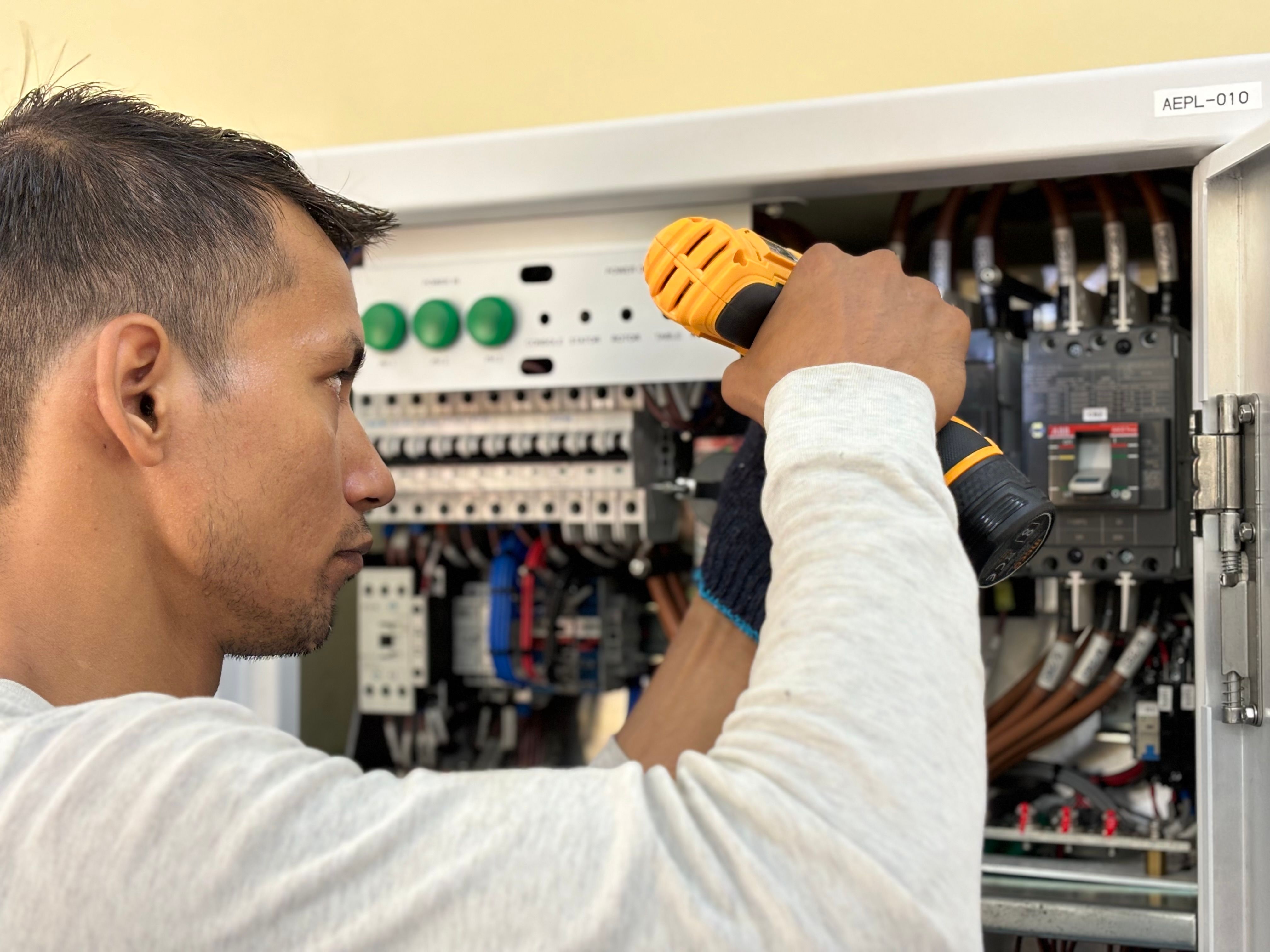 Electrician working on a distribution board